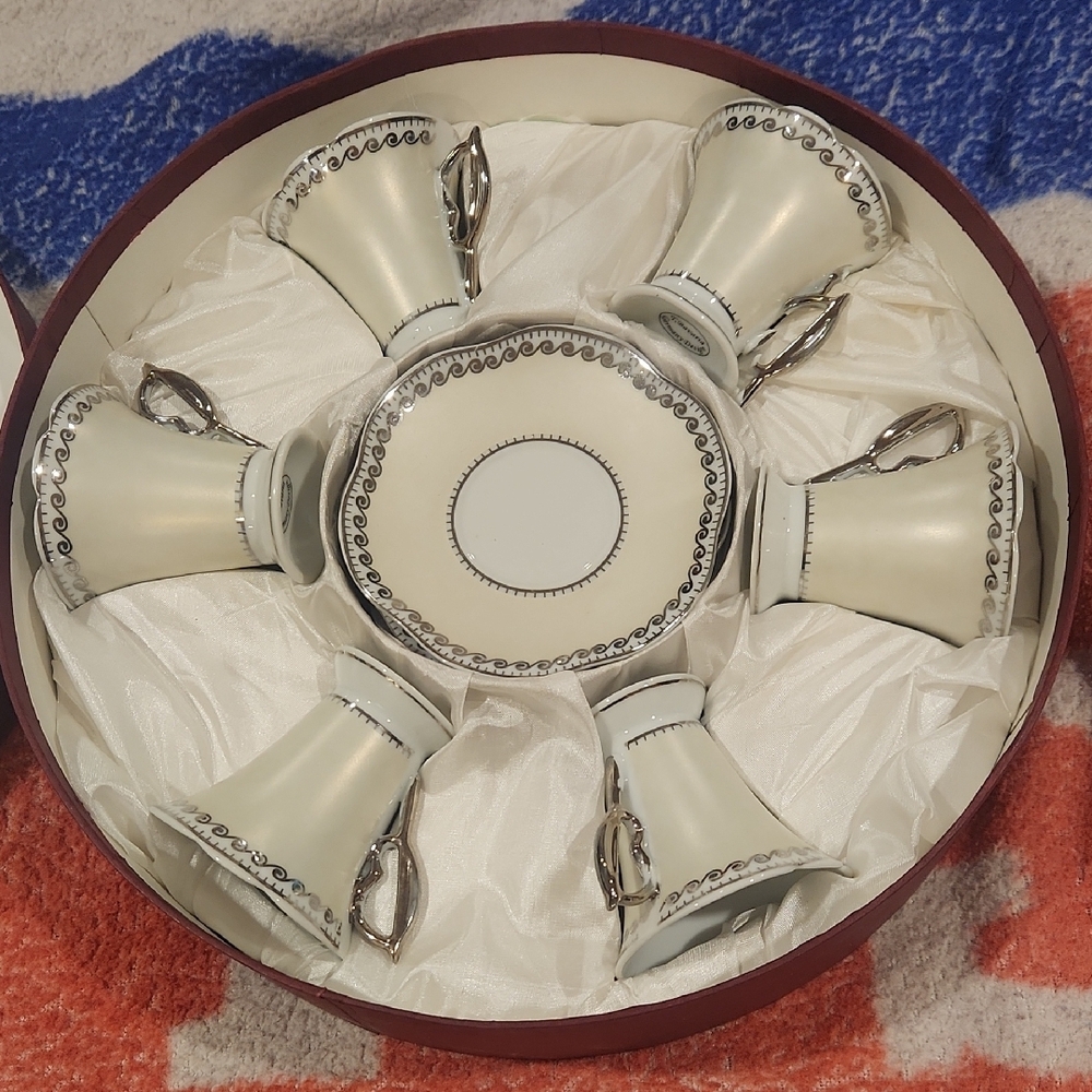 Elegant White and Silver Mug Set T. Bavaria. Never used, but box is worn.
